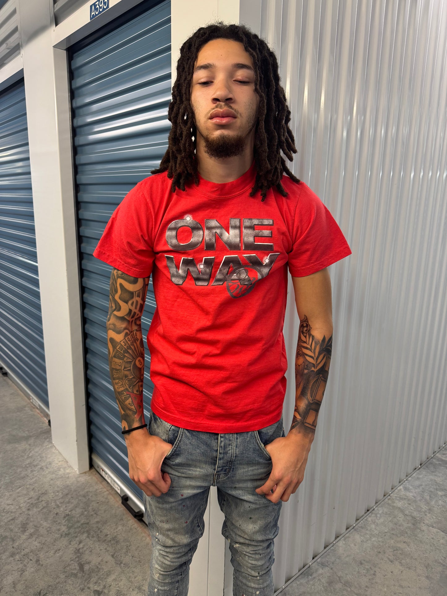 RED "STEEL STATEMENT" TEE